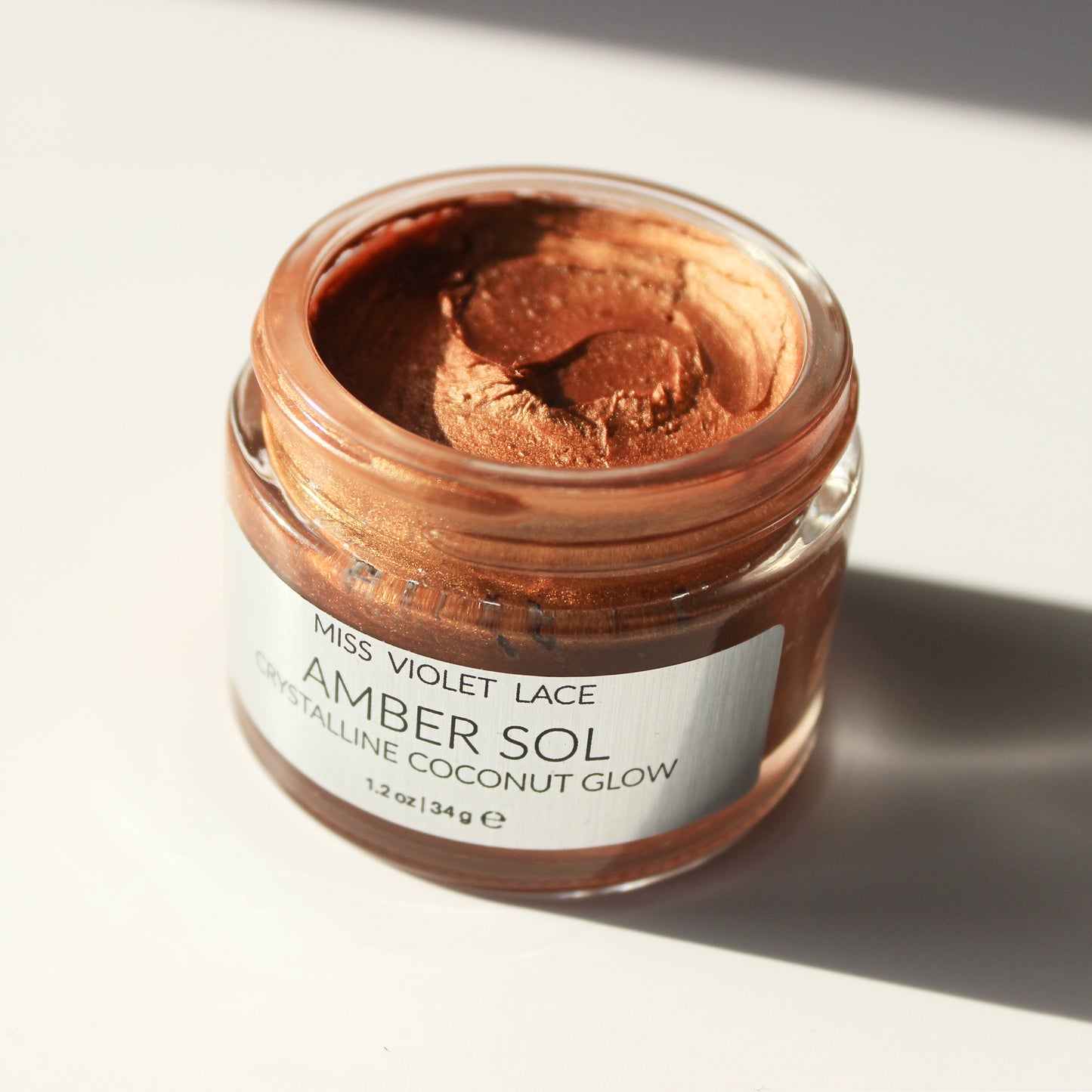 amber sol · crystalline coconut glow